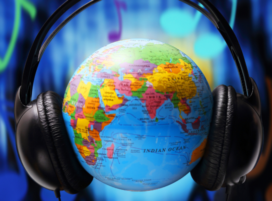 Planet Earth wearing black headphones against a dark blue background