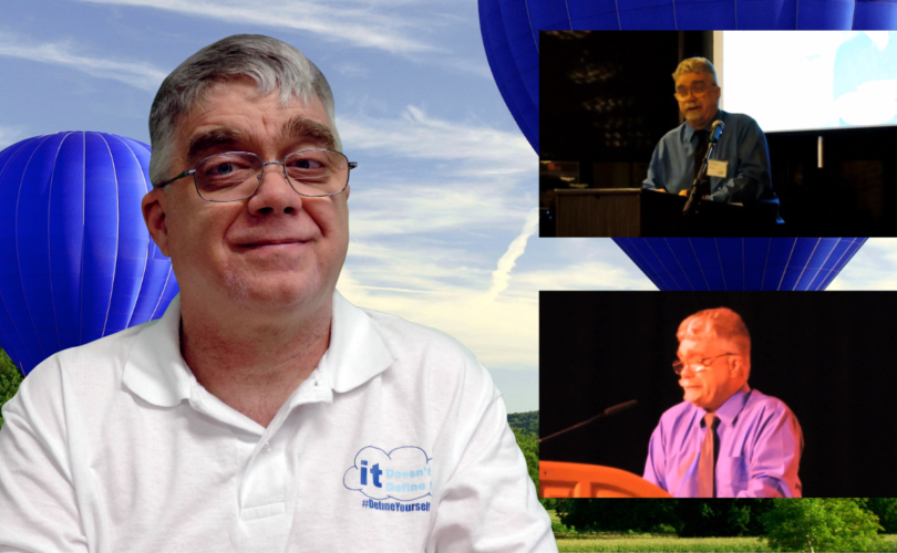Left side of image is Chris in a white polo shirt with “it Doesn’t Define Me” printed in blue on polo shirt. Right side of image has 2 photos of Chris delivering speeches in front of audiences. Chris is dressed in a dress shirt and tie. Image background is 2 blue hot air balloons in the air, rising above green trees against a blue shy with some white clouds.
